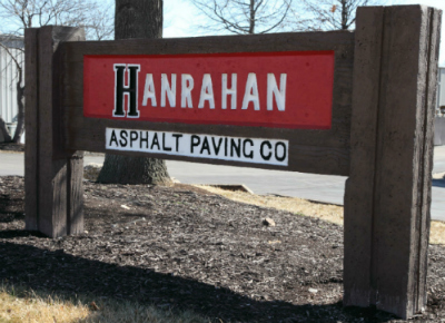 The sign of hanrahan asphalt paving co outside of a building